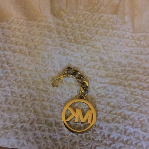 Two (2) Authentic Michael Kors Gold medallions - Picture 2 of 2